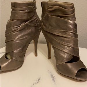 Beautiful distressed peep toe booty